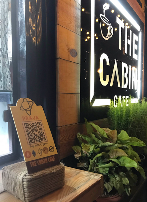 PRAJA QR Code at Partner Outlet