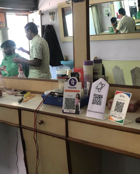 PRAJA QR Code at Partner Outlet